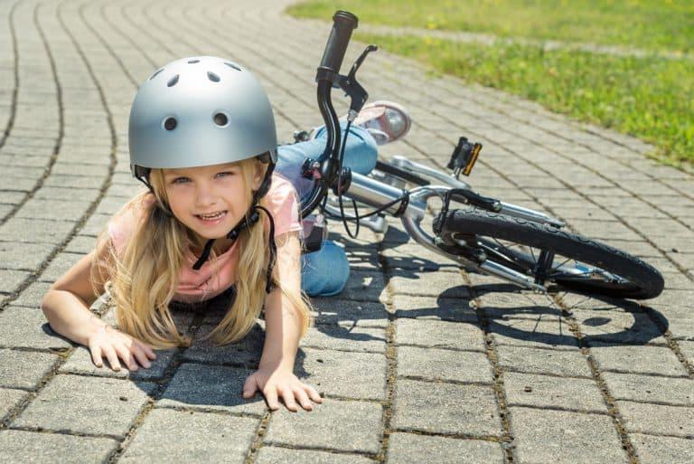 kid falling off bike